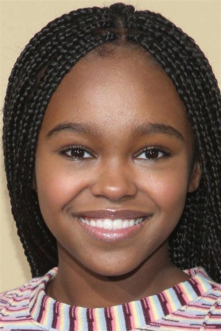 Lidya Jewett smiling for a picture while enjoying the snow in Toronto, Ontario in December 2020