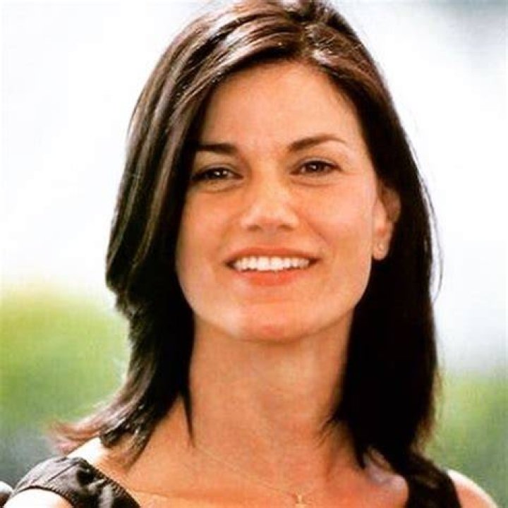 Linda Fiorentino as seen while smiling in a picture