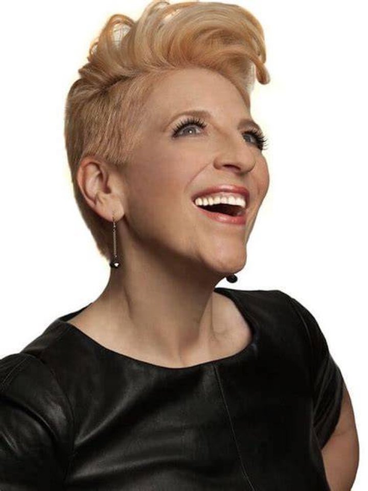 Lisa Lampanelli looking happy after surgery