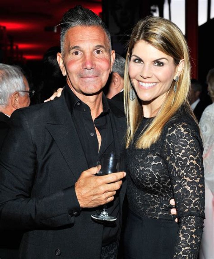 Lori Loughlin and Mossimo Giannulli out in Aspen in December 2013