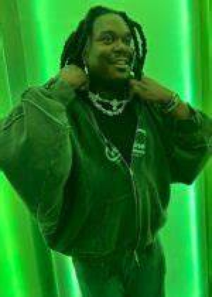 Lucki as seen while smiling for a picture in April 2023