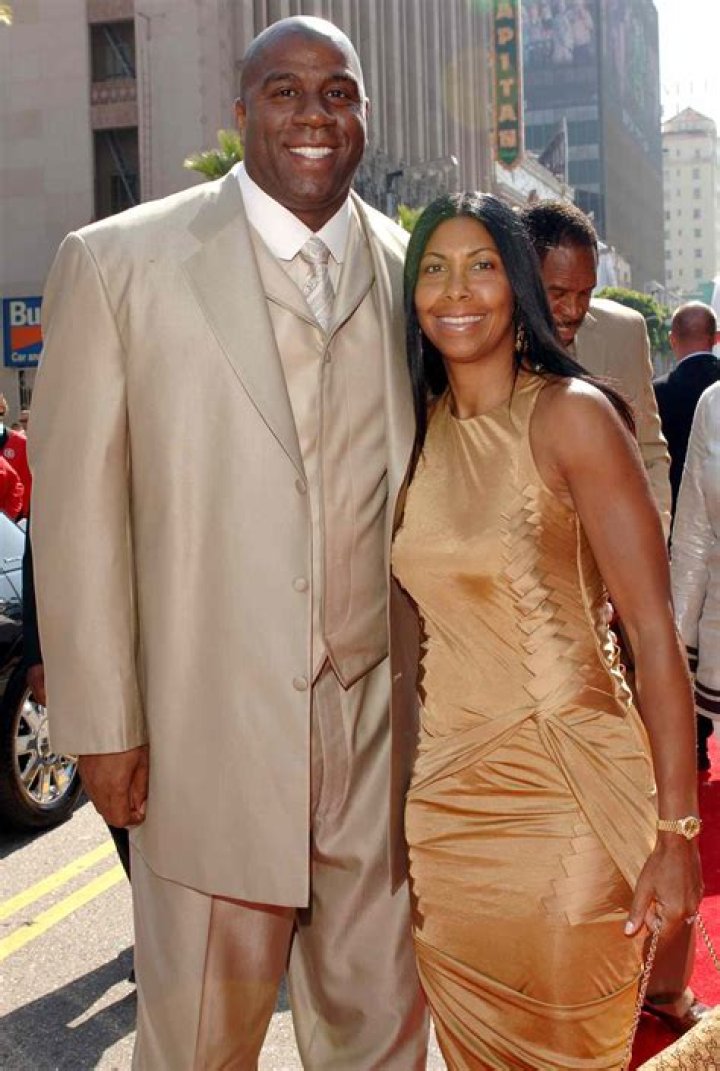 Magic Johnson with wife Cookie Johnson (Left) and daughter Elisa Johnson at the baseball match of Los Angeles Dodgers in 2018