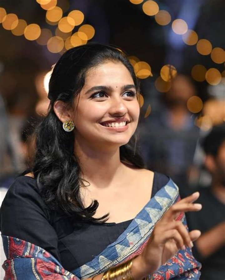 Mamitha Baiju smiling in a picture alongside her father in June 2021