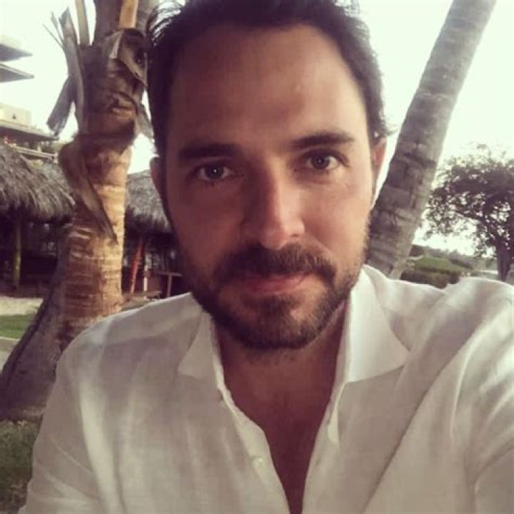 Manolo Cardona seen taking a selfie in April 2021