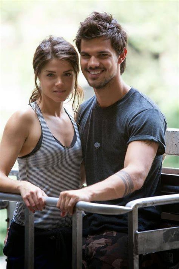 Marie Avgeropoulos and Taylor Lautner at the Jay-Z concert in Los Angeles in December 2013