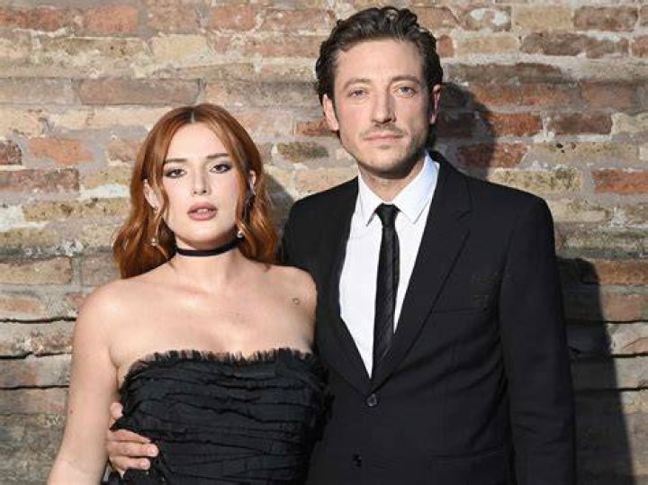 Mark Emms and Bella Thorne sharing a romantic kiss in February 2023