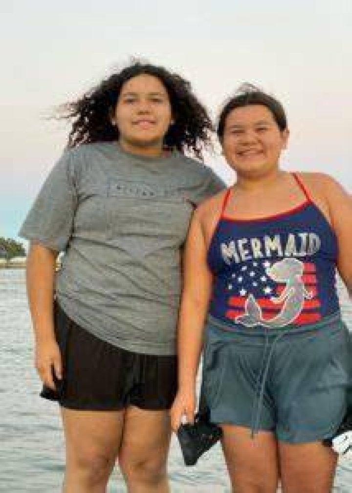 Mary LifeWithBrothers along with her sister Izzy while on a boat trip in July 2020