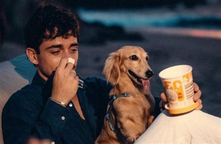 Max Charles with his dog in December 2012
