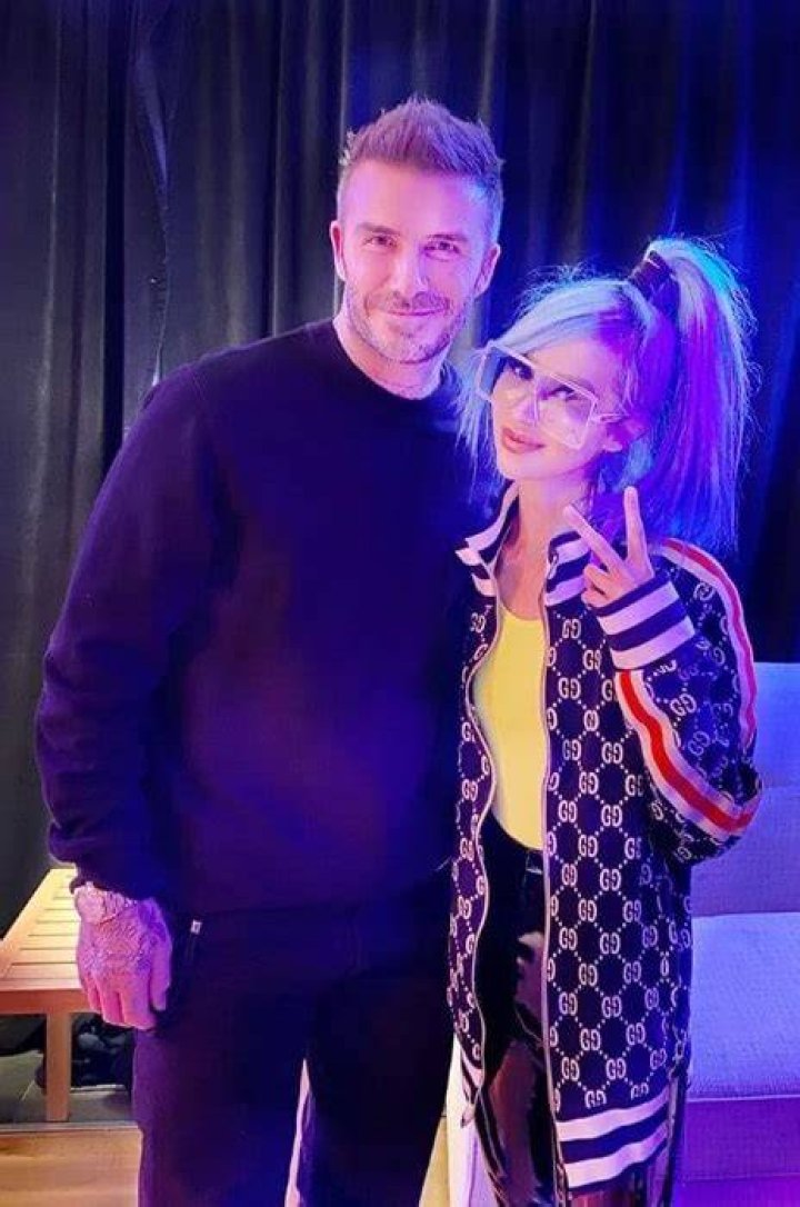 Melissa Reese and David Beckham smiling for a picture at the AmericanAirlines Arena in Miami, Florida in 2020