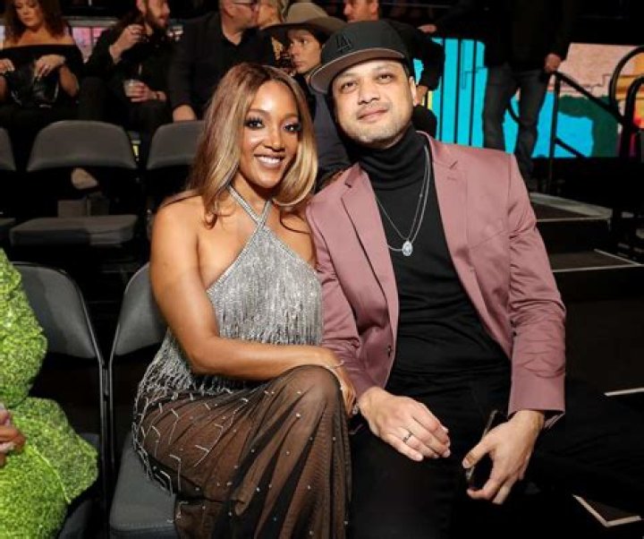 Mickey Guyton with her husband wishing everyone a Happy Valentine&rsquo;s Day in February 2020