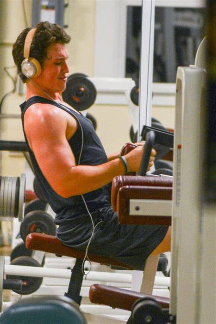 Miles Teller working out in the gym