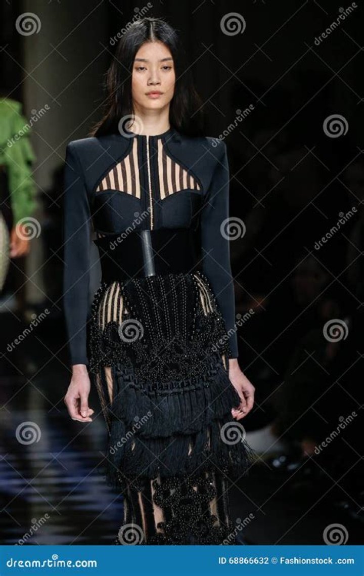 Ming Xi walks the runway during the 2014 Victoria's Secret Fashion Show.