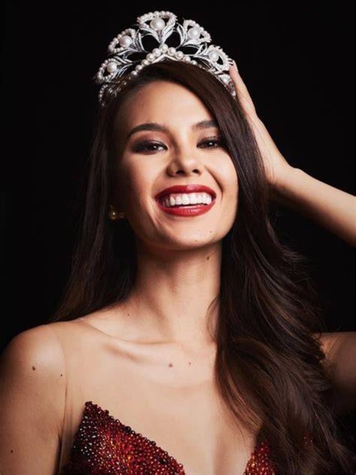 Miss Universe 2018 Catriona Gray appearing with President Rodrigo Duterte and politician Bong Go at the Villamor Air Base in Pasay in December 2018