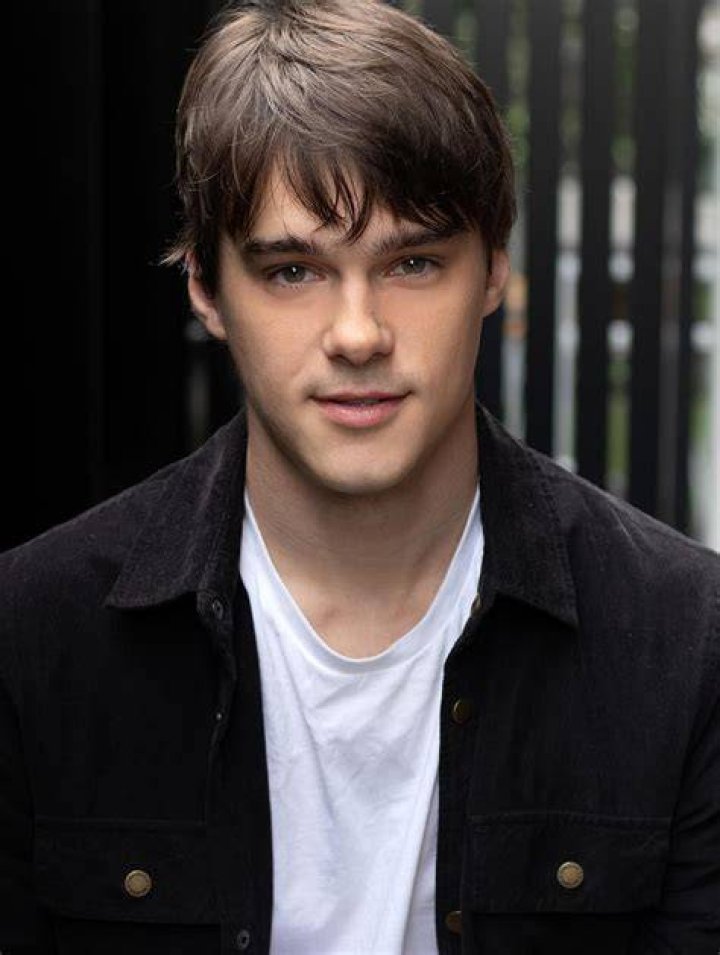 Mitchell Hope posing for a picture at a zoo in November 2015