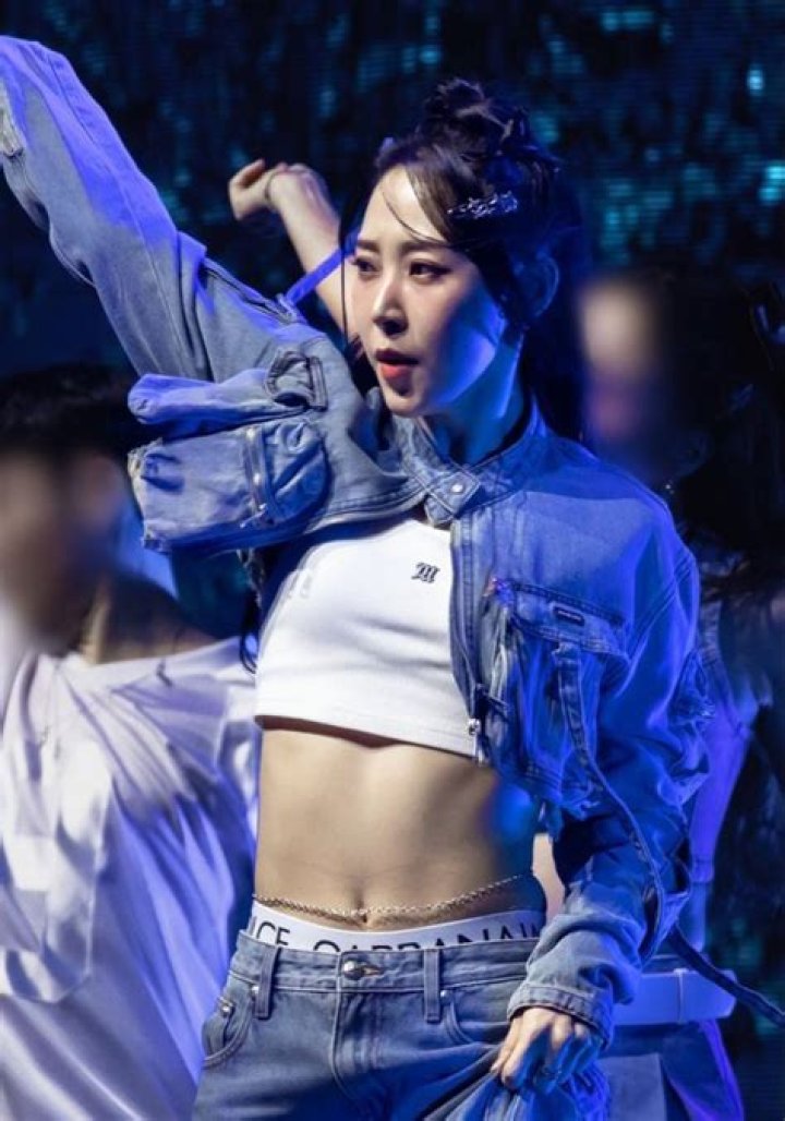 Moonbyul as seen in a picture while performing during an event in May 2018