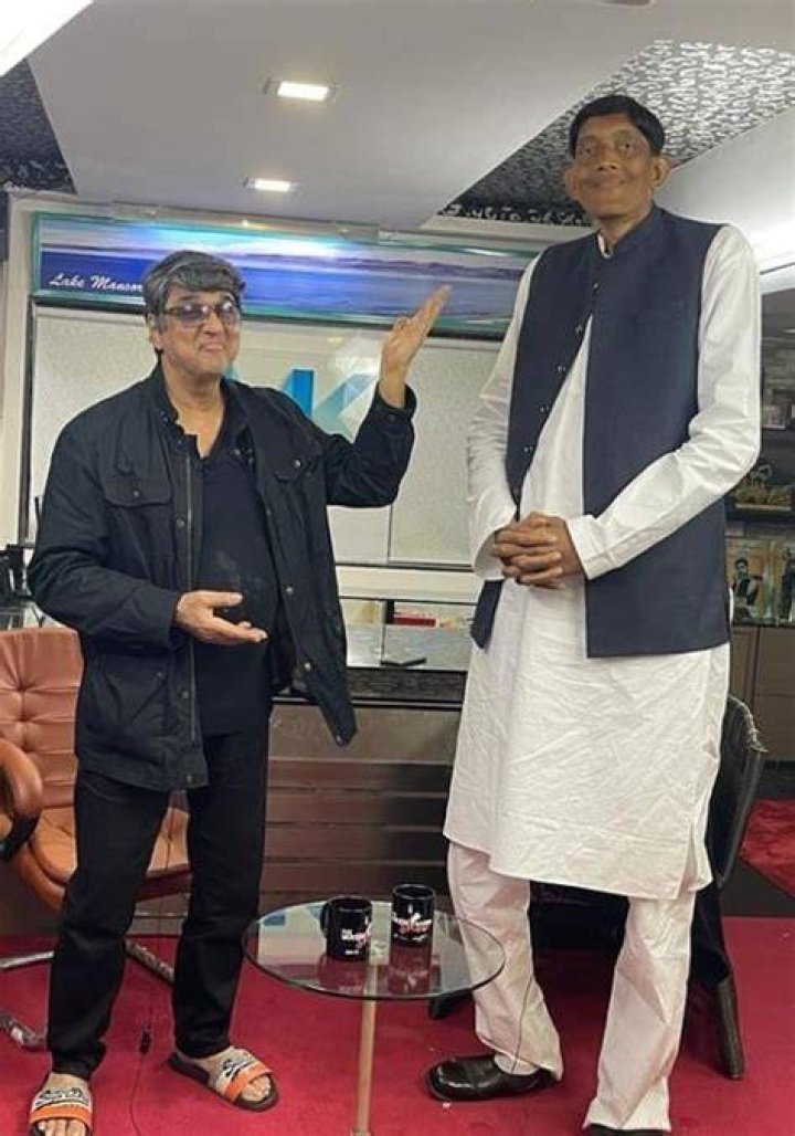Mukesh Khanna (Left) posing for a picture with Dharmendra Pratap Singh