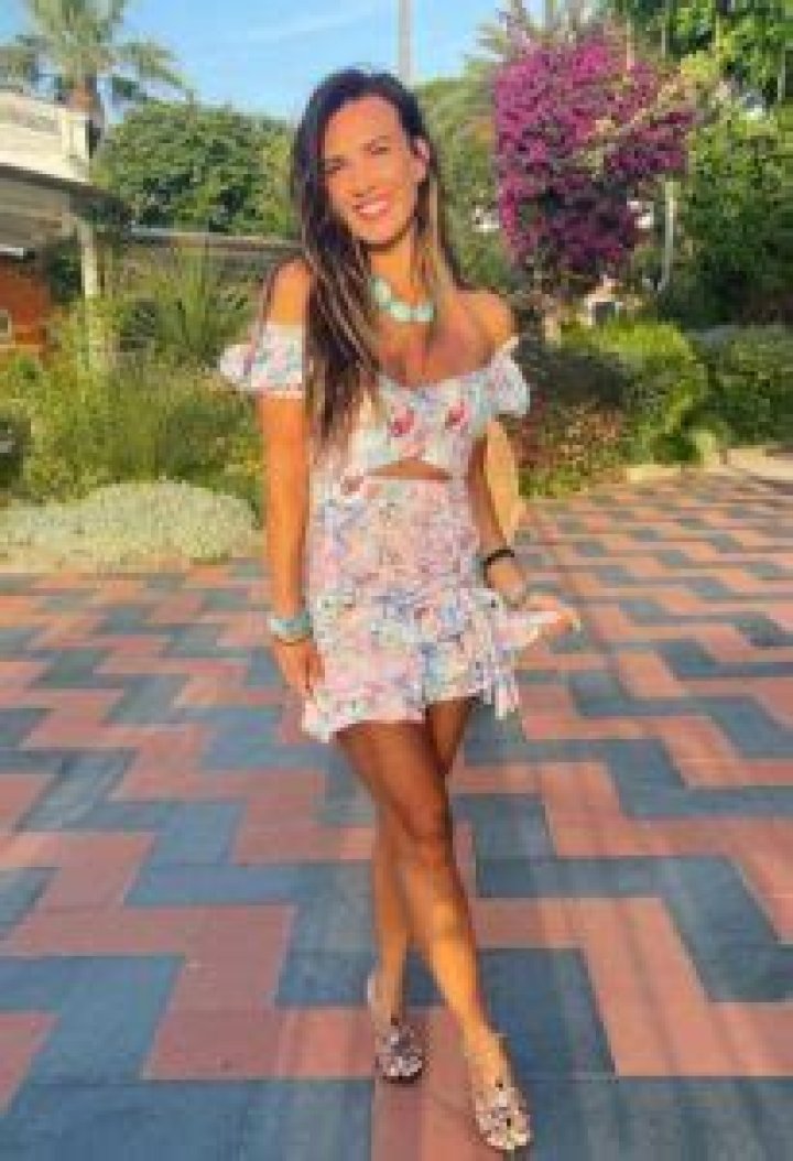 Natalie Burn smiling for a picture in Italy in July 2022