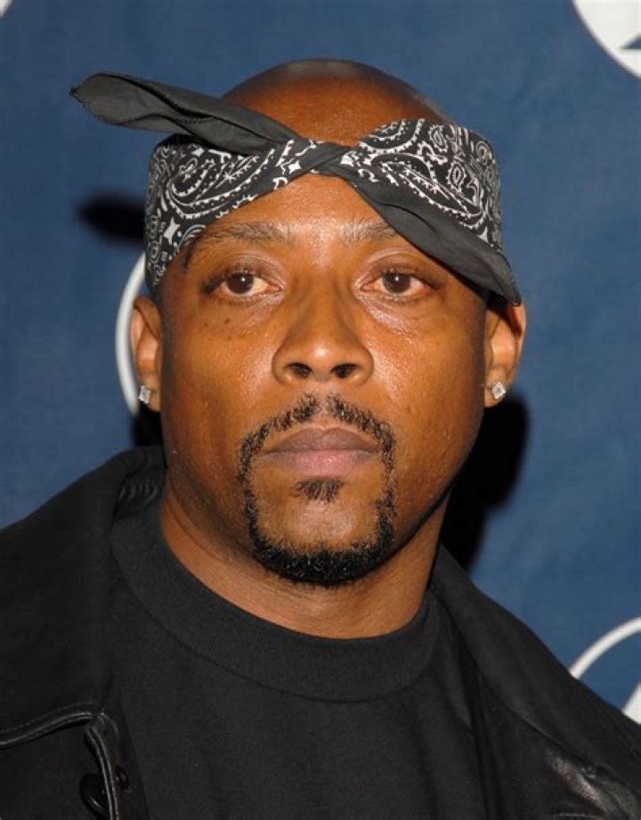 Nate Dogg in a picture with the kids from Snoops league junior football team
