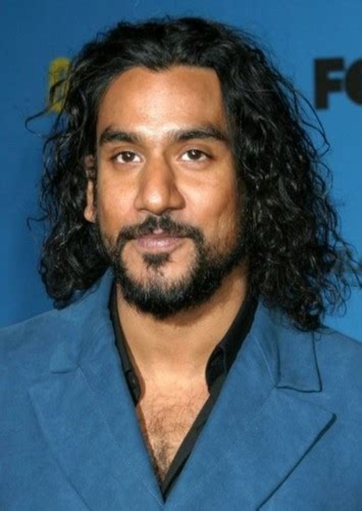 Naveen Andrews with a fan as seen in January 2019