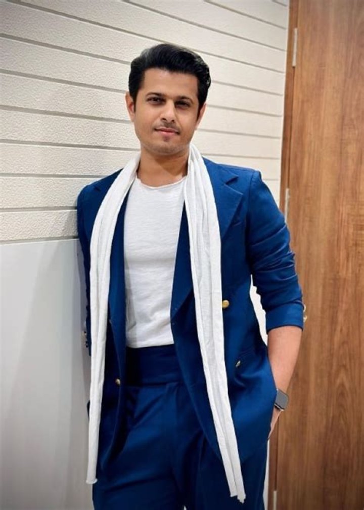Neil Bhatt as seen while smiling for a picture in February 2023