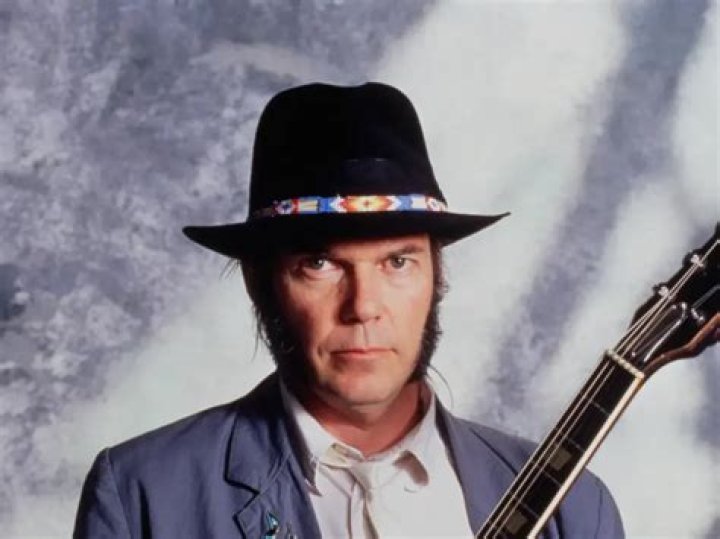 Neil Young as seen while performing at the Trent FM Arena in Nottingham in June 2009