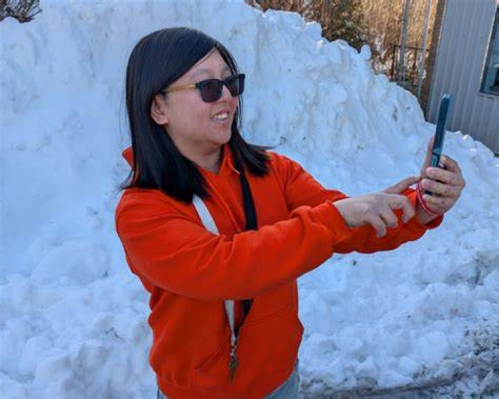 Nita taking a selfie with her boyfriend Josh Villalta in August 2019