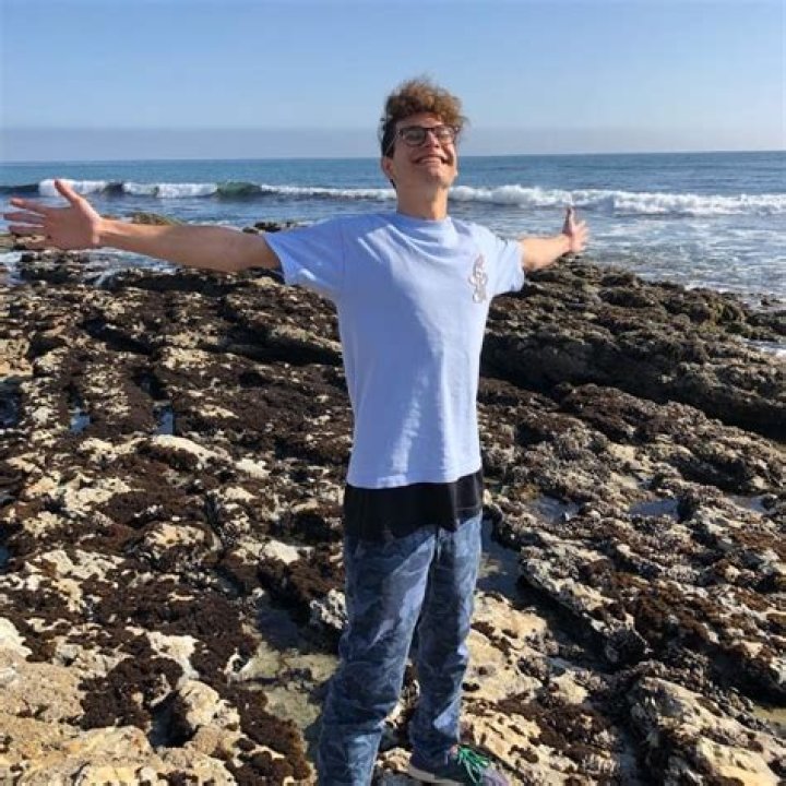 Noah Grossman as seen while posing for a picture by the beach in May 2019