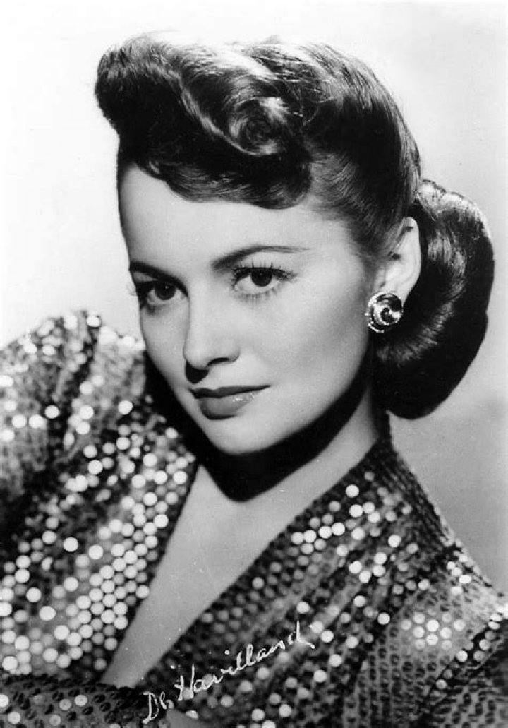 Olivia de Havilland as seen in the publicity photo for 'Santa Fe Trail' (1940)
