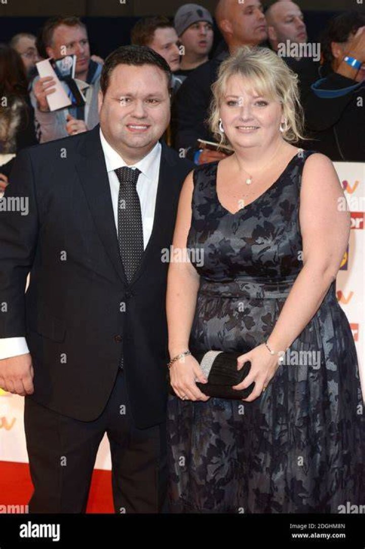 Paul Potts with his wife as seen in July 2019