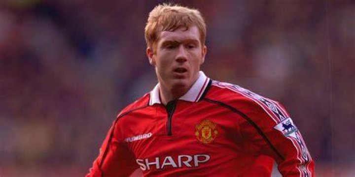 Paul Scholes in Manchester United dugout while working as an assistant manager in April 2014