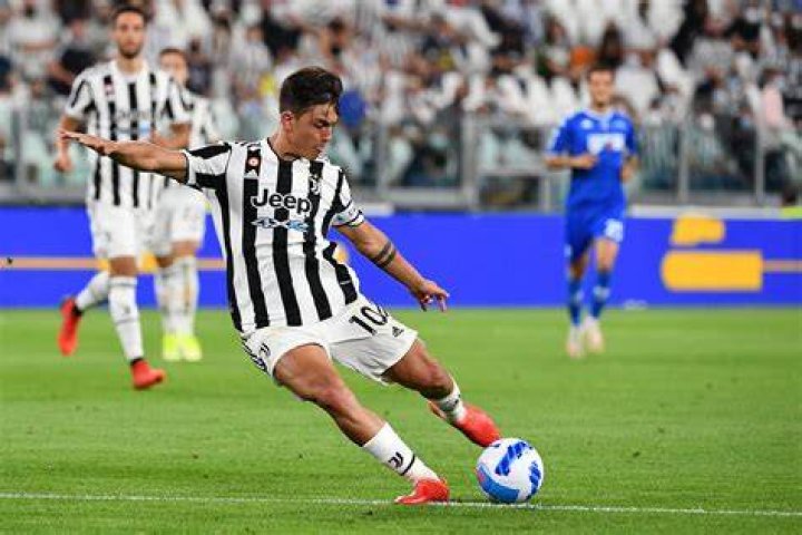 Paulo Dybala on the playing field during a practice session in 2017