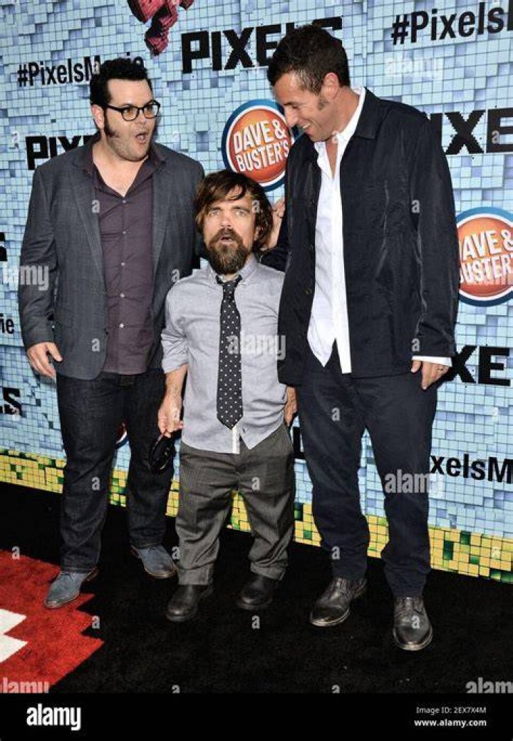Peter Dinklage with Josh Gad (Left) and Adam Sandler (Right) attend the "Pixels" New York Premiere at Regal E-Walk on July 18, 2015 in New York City