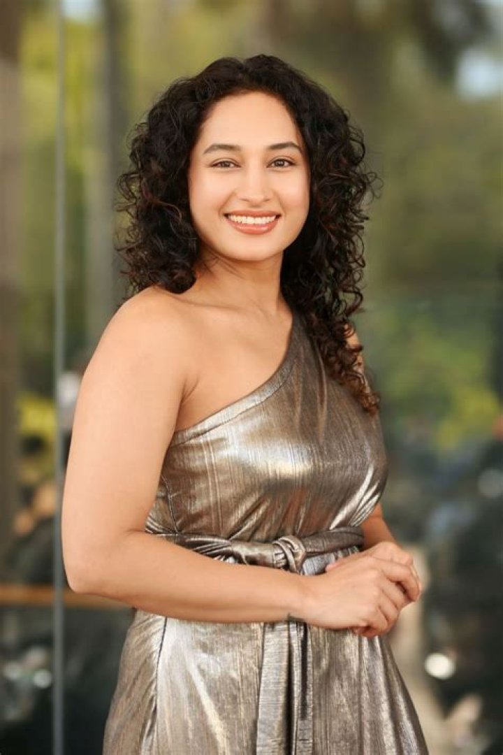 Pooja Ramachandran as seen while smiling in a picture along with John Kokken during a lunch date at a restaurant in 2023