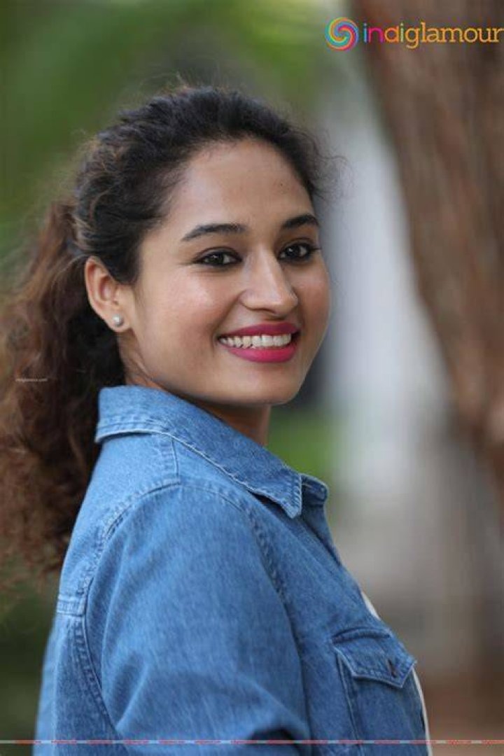 Pooja Ramachandran smiling in a selfie while enjoying her ice-cream in August 2023