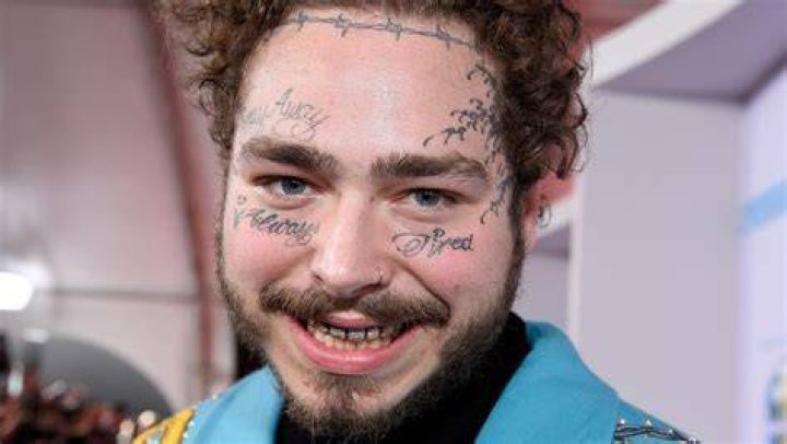 Post Malone showing his face tattoos in 2020