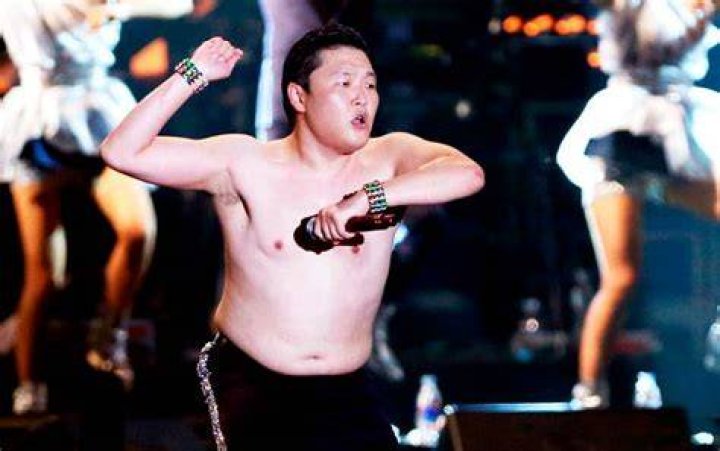 Psy shirtless while giving a performance in 2012