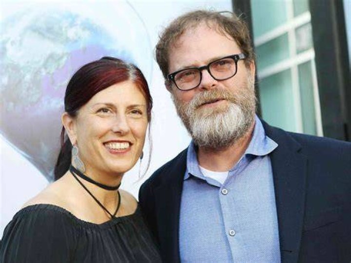 Rainn Wilson and Holiday Reinhorn skiing in February 2018