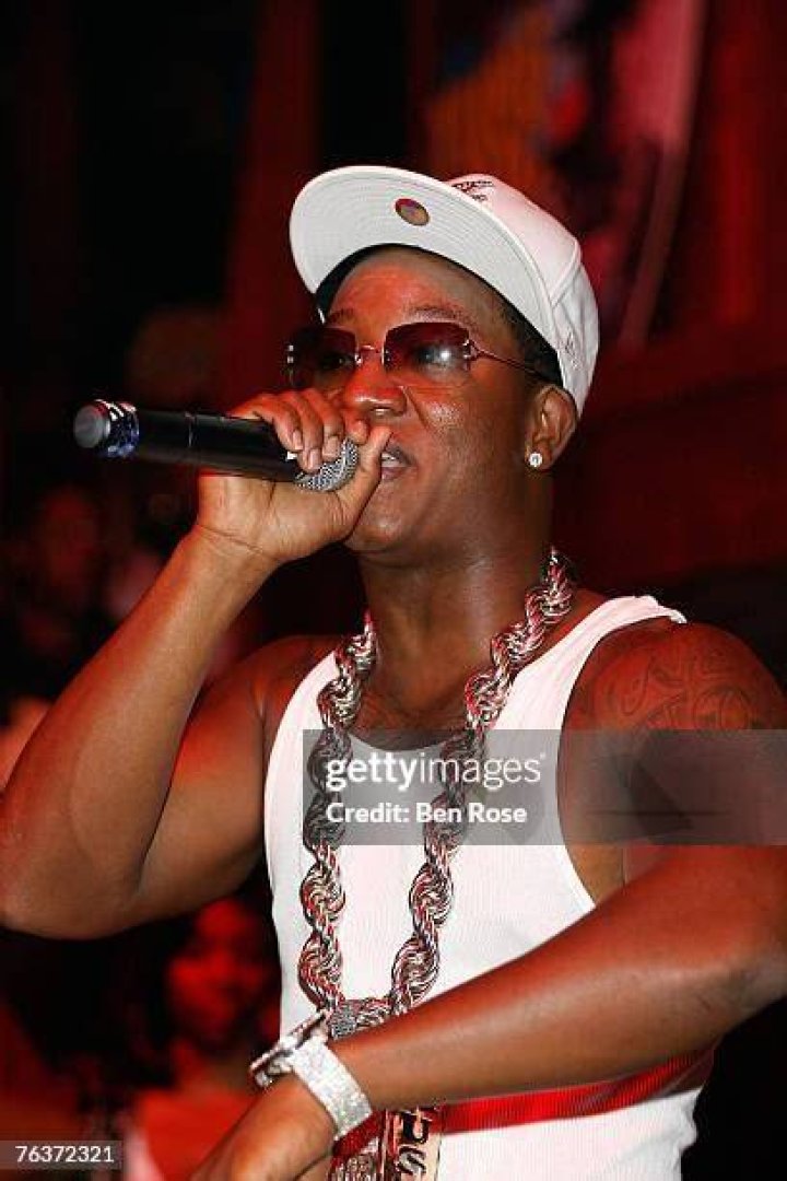 Rapper Yung Joc performing in a concert aboard the aircraft carrier USS Dwight D. Eisenhower (CVN 69) in April 2009