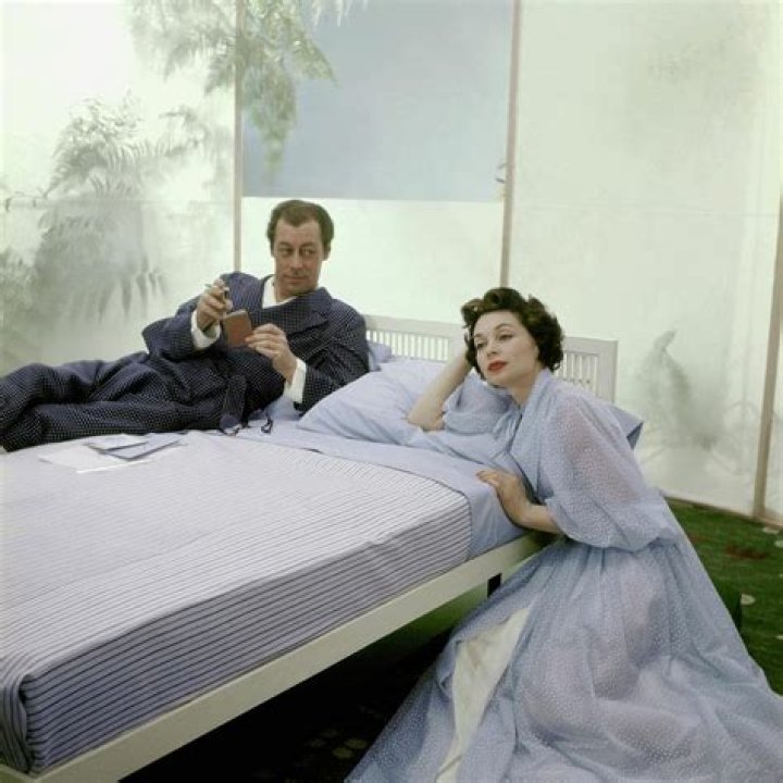 Rex Harrison as photographed with his wife Lilli Palmer in 1950