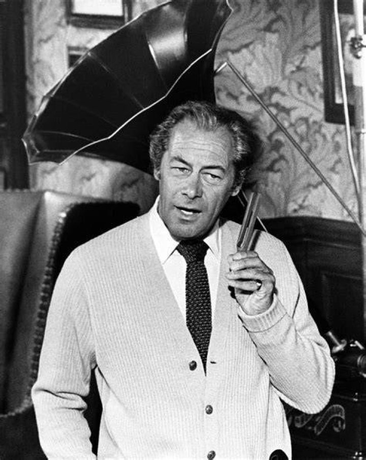 Rex Harrison as Professor Henry Higgins seen alongside Julie Andrews as Eliza Doolittle in the musical My Fair Lady