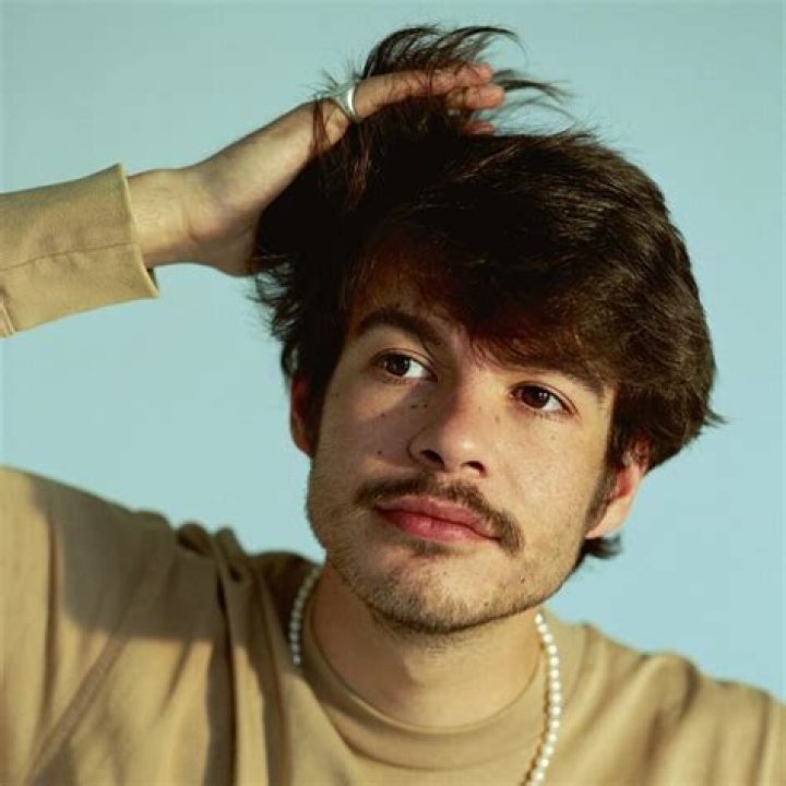 Rex Orange County with his dog as seen in May 2018
