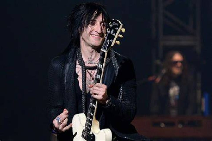Richard Fortus as seen in a black-and-white picture