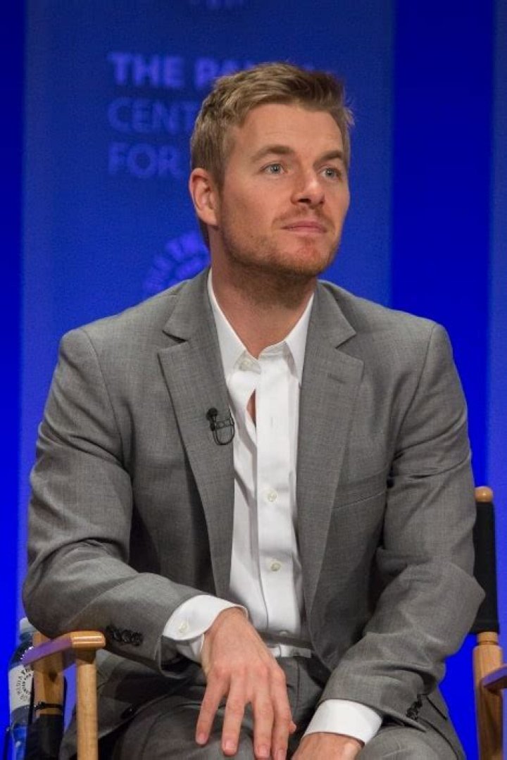 Rick Cosnett as seen while smiling for a picture alongside Michelle Alexandra at The Rose Venice in February 2020
