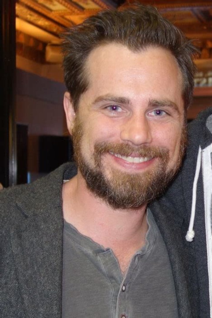 Rider Strong as seen while smiling for the camera during an event in 2016