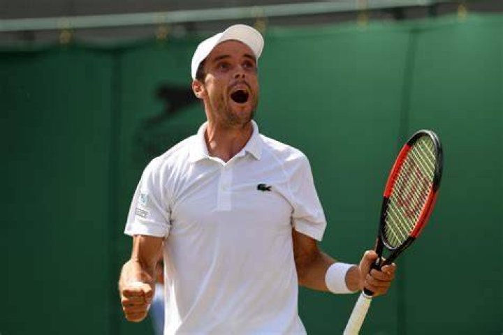 Roberto Bautista Agut celebrates a win against Joao Sousa at ABN AMRO World Tennis Tournament on February 10, 2016 in Rotterdam, Netherlands