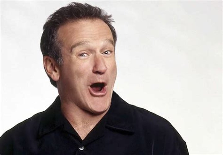 Robin Williams posing for the camera at the 'Happy Feet Two' Australian premiere at the Entertainment Quarter in Sydney, Australia in December 2011