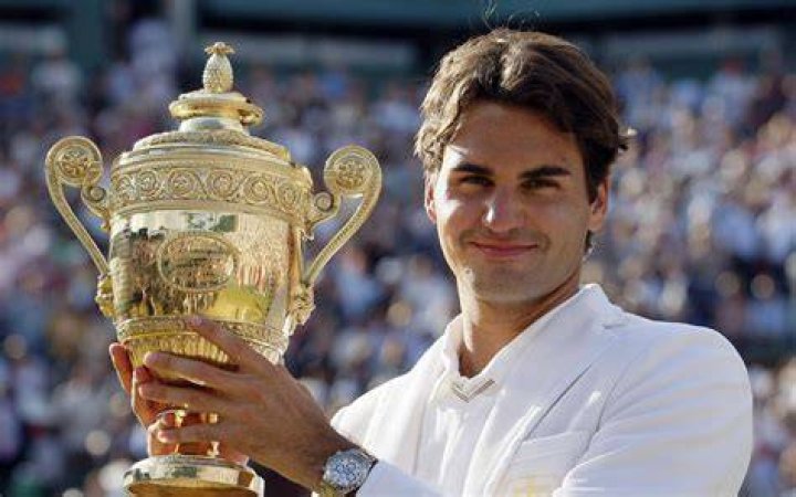 Roger Federer with a trophy.