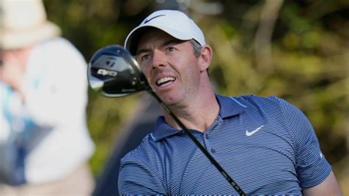Rory McIlroy watches his shot in a PGA Tournament in 2015