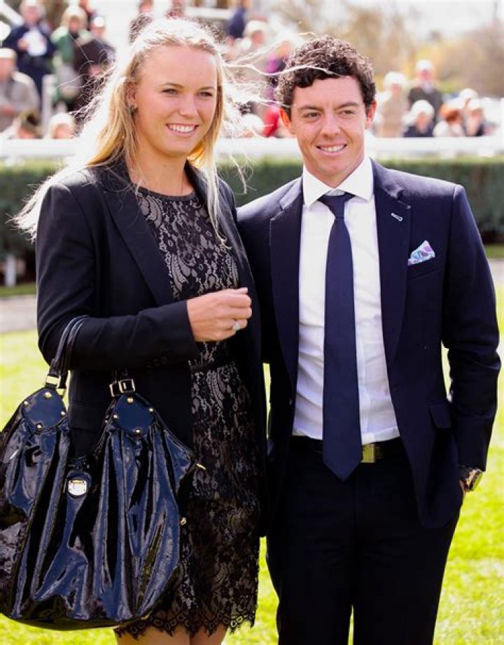 Rory McIlroy with Caroline Wozniacki at the US Golf Writers Dinner in April 2013