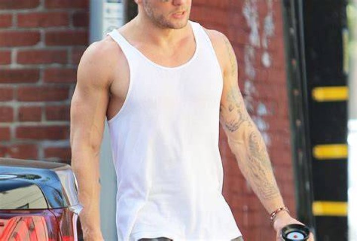 Ryan Phillippe after hitting the gym showing his arms and body in January 2017